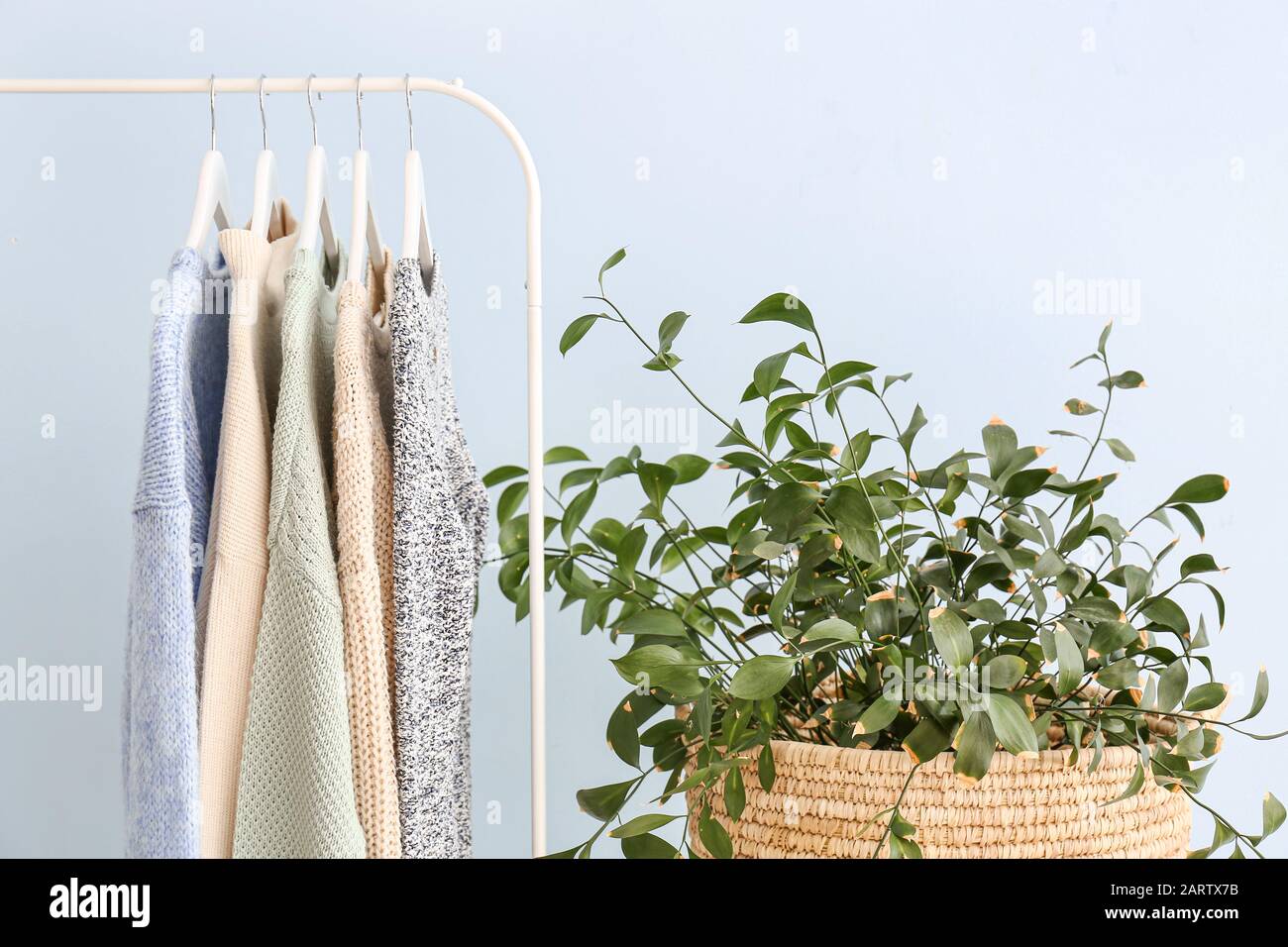 Winter Cloth Rack Rack with winter clothes in dressing room Stock Photo - Alamy
