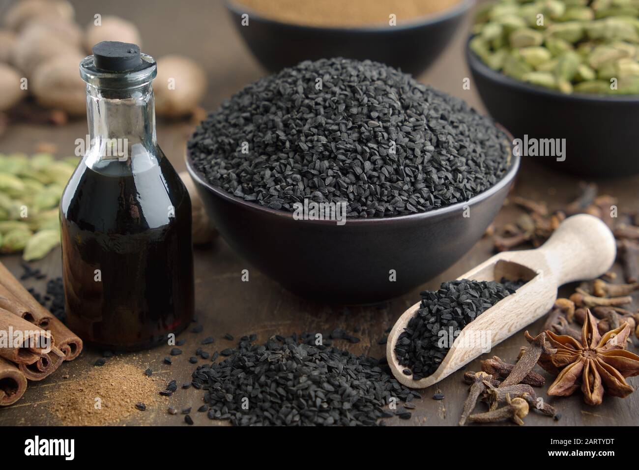 Black Cumin Or Roman Coriander Seeds And Black Caraway Oil Bottles Aromatic Spices On Table Cardamom Anise Cloves Cinnamon Turmeric Ingredient Stock Photo Alamy