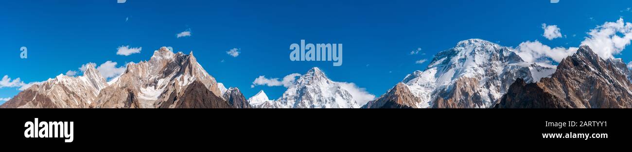 Panoramic view of Karakoram mountains range with K2 (in the middle) surrounding by Crystal, Marble, Angel, Nera and Broad peak from Vigne Glacier, on Stock Photo