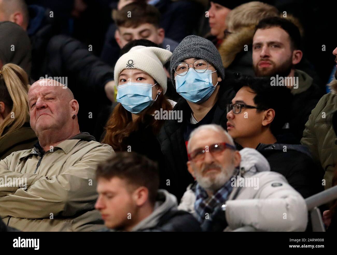 Fans in face masks during the Carabao Cup Semi Final, second leg match