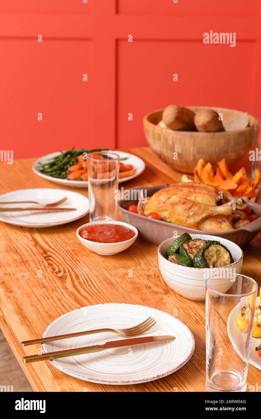 Table set for big family dinner Stock Photo - Alamy