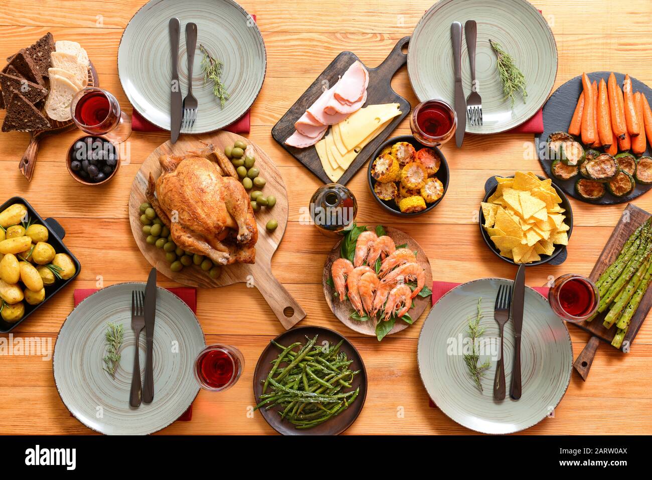 Table set for big family dinner, top view Stock Photo - Alamy