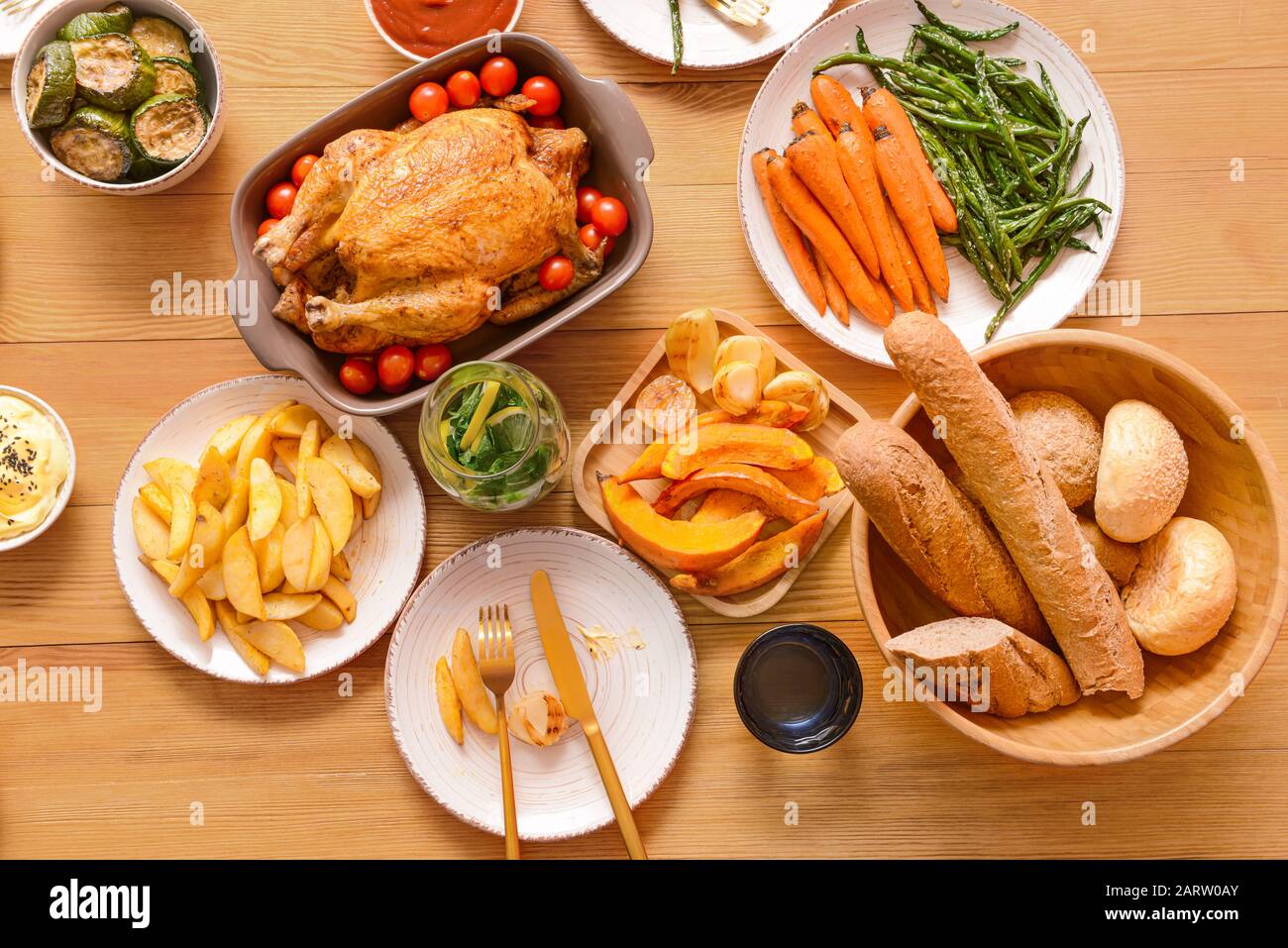 Table set for big family dinner, top view Stock Photo - Alamy