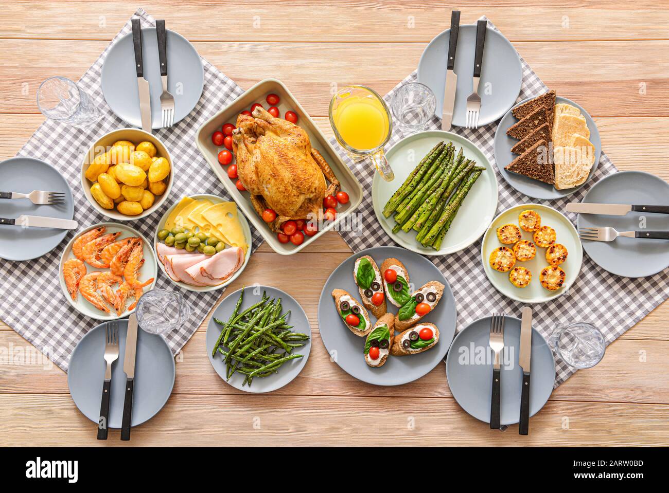 Table set for big family dinner, top view Stock Photo - Alamy