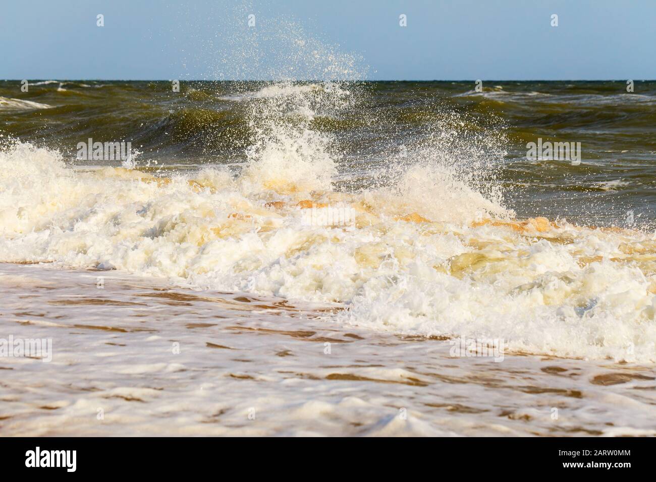 Sea waves breaking on the shore Stock Photo - Alamy