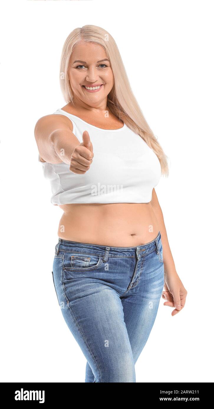 Mature body positive woman showing thumb-up on white background Stock Photo  - Alamy