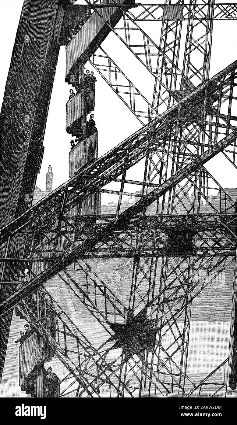 Workmen descending during construction of the Eiffel Tower between 1887 to 1889 as the entrance to the 1889 World's Fair, on the Champ de Mars in Paris, France. The wrought-iron lattice tower is named after the engineer Gustave Eiffel, whose company designed and built the tower. It was initially criticised by some of France's leading artists and intellectuals for its design, but it has become a global cultural icon of France and one of the most recognisable structures in the world. Stock Photo