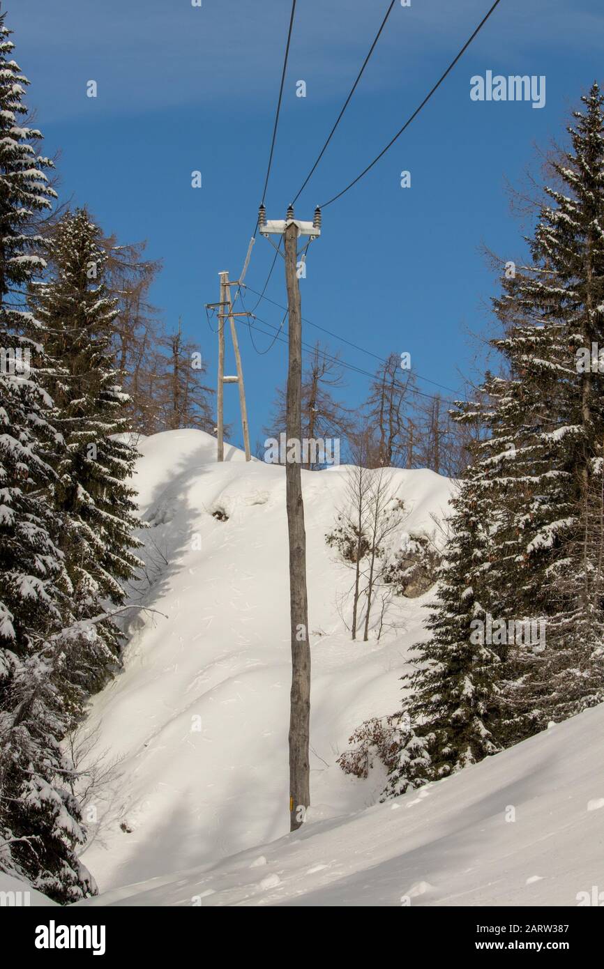 Electrical cables covered in snow, near Komna Stock Photo Alamy