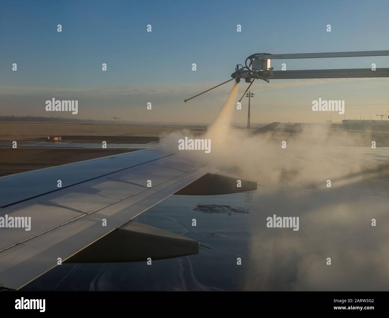 Aiprlane deicing at the airport Stock Photo