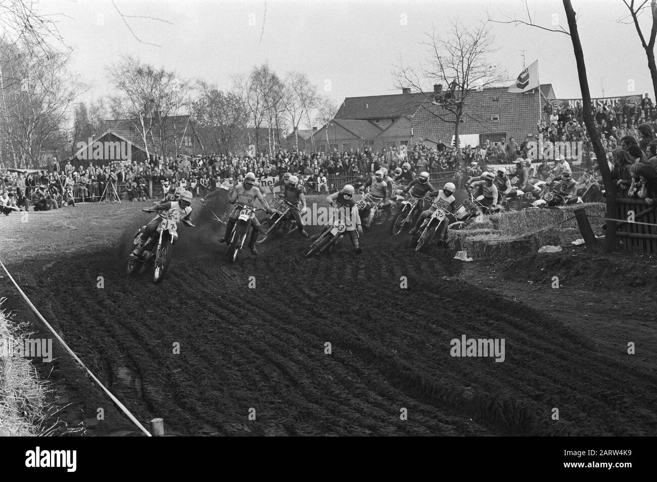 International motocross of the Aces in Saint Anthonis  Start of the 500cc, left Wolsink (7) Date: March 13th 1977 Location: Noord-Brabant, Sint Anthonis Personal name: Peter Herlings (Maico, 17), Gerrit Wolsink ( Suzuki, behind him), Håkan Andersson (Montesa, Wolsink's left), Peter Willems (14), Show Karsmakers (Maico, 32), Arne Lodal (Husqvarna, 39), Heikki Mikkola (Yamaha, 37) Keywords: circuits, motocross, competitions Personal name: Wolsink, Gerrit Stock Photo