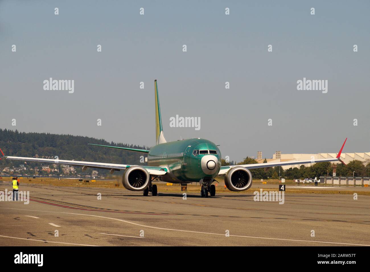 New aircraft during engine tests at the airport. Aircraft factory. Stock Photo