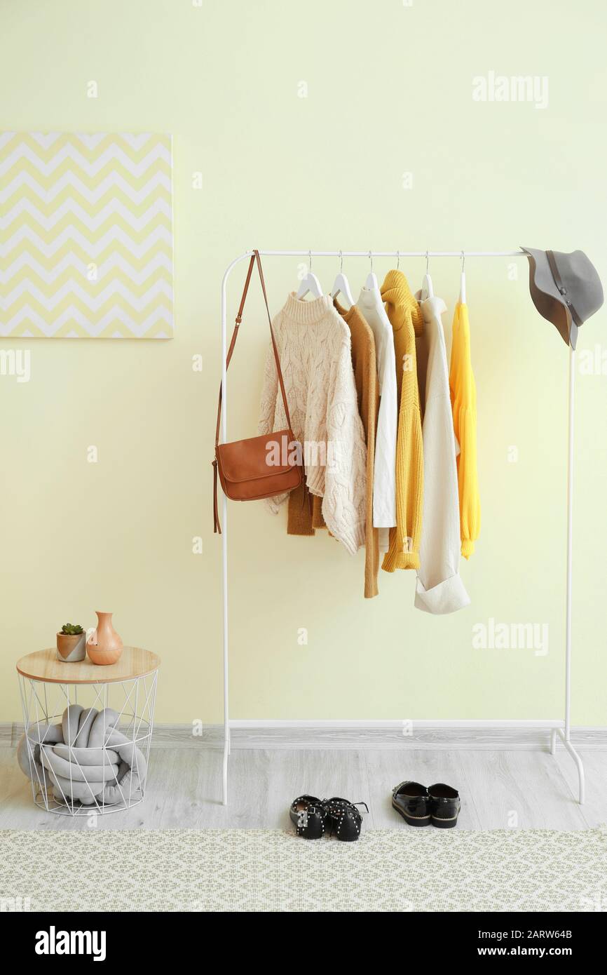 Interior of hall with clothes rack Stock Photo Alamy