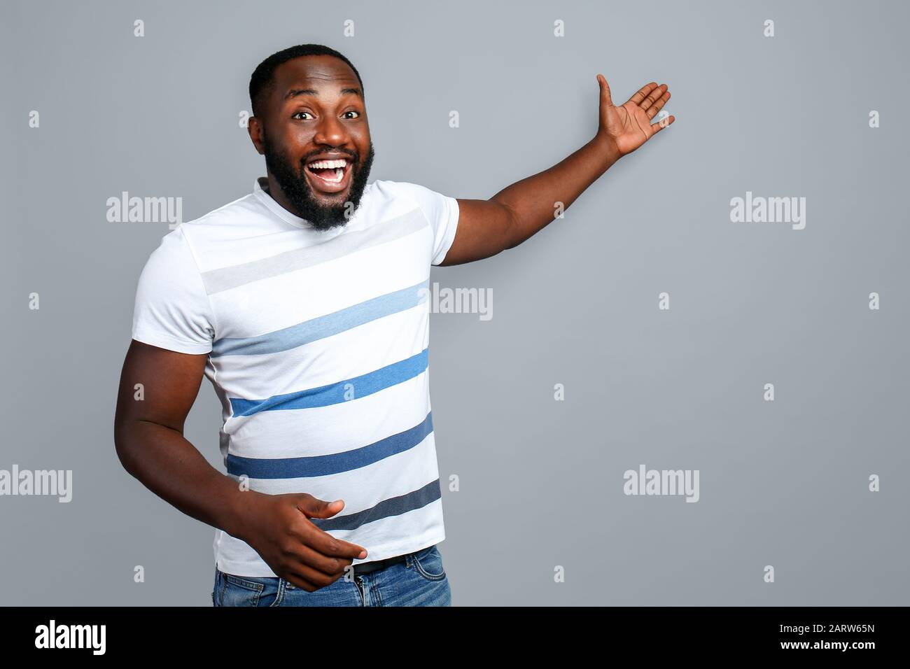 Happy african american man showing hi-res stock photography and images ...