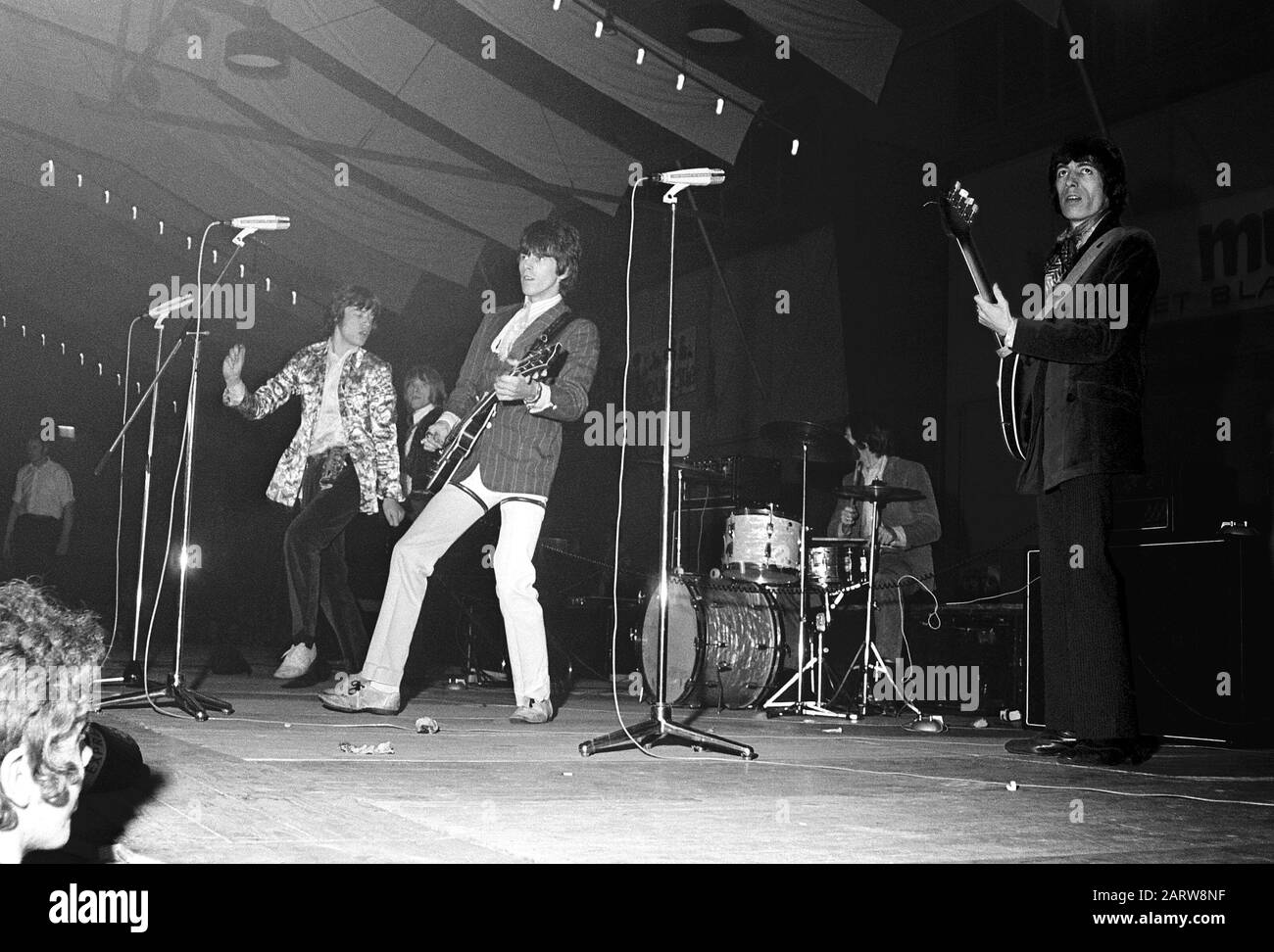 Rolling Stones in concert, Houtrusthallen in The Hague (NL), 15 April 1967.  This is a cropped and retouched (removed scratches and spots, edited  brightness, sharpened) version of the image from the National