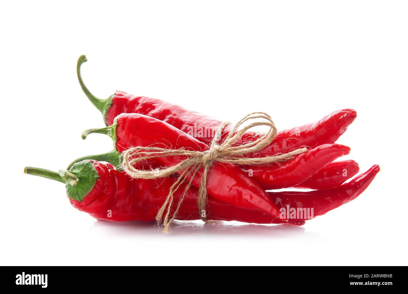 Red chili peppers on white background Stock Photo - Alamy