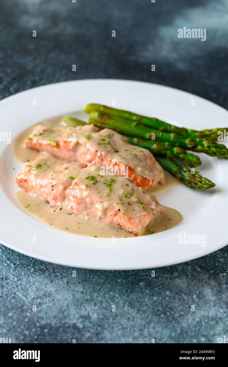 Salmon with creamy coconut sauce Stock Photo Alamy