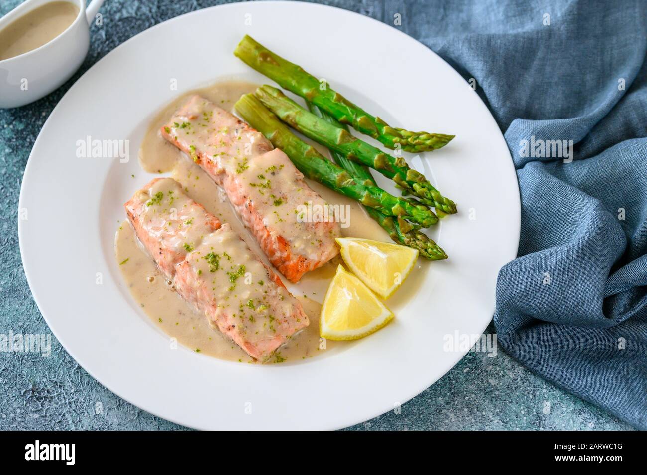 Salmon with creamy coconut sauce Stock Photo Alamy