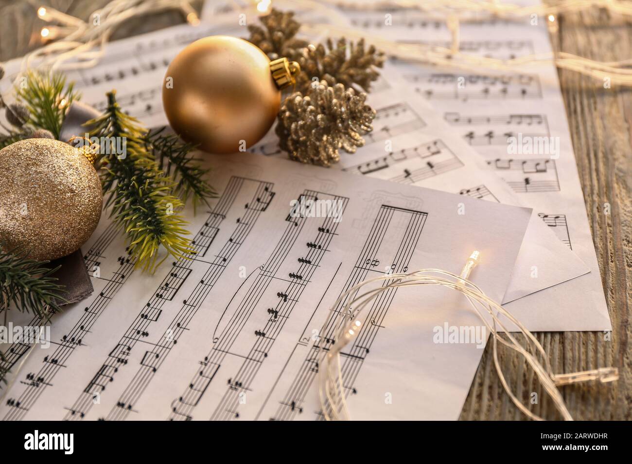 Christmas Composition With Music Notes On Table Stock Photo