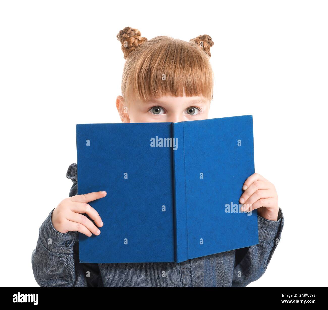 Cute little girl with book on white background Stock Photo - Alamy