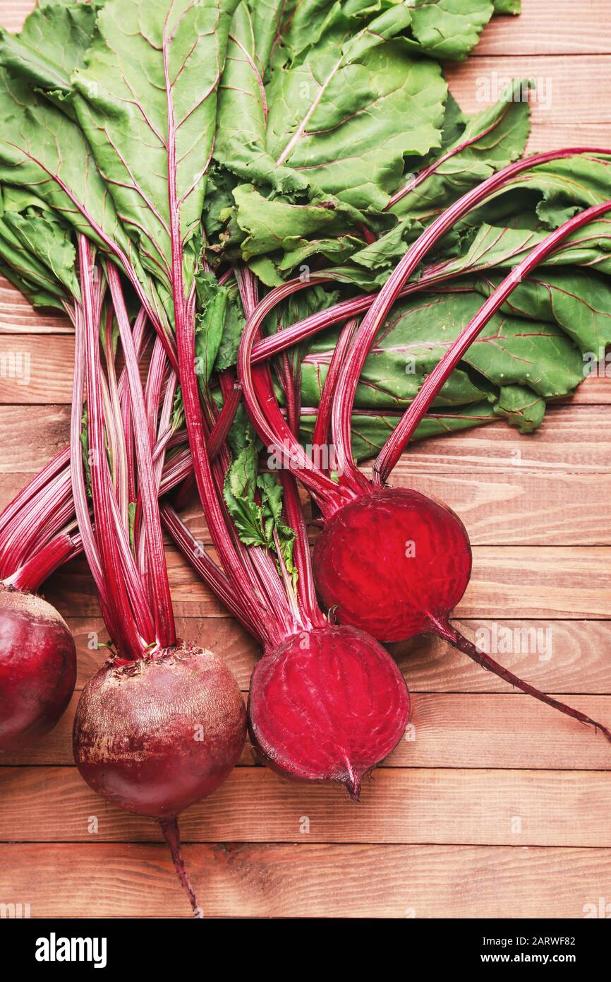 Fresh beets on wooden background Stock Photo