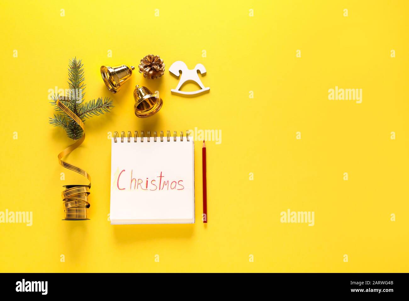 Beautiful Christmas composition with notebook on color background Stock Photo