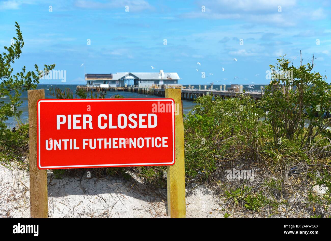 ANNA MARIA, FL - October 2,  2017: Anna Maria Historic Pier is closed after being extensively damaged by Hurricane Irma. Stock Photo