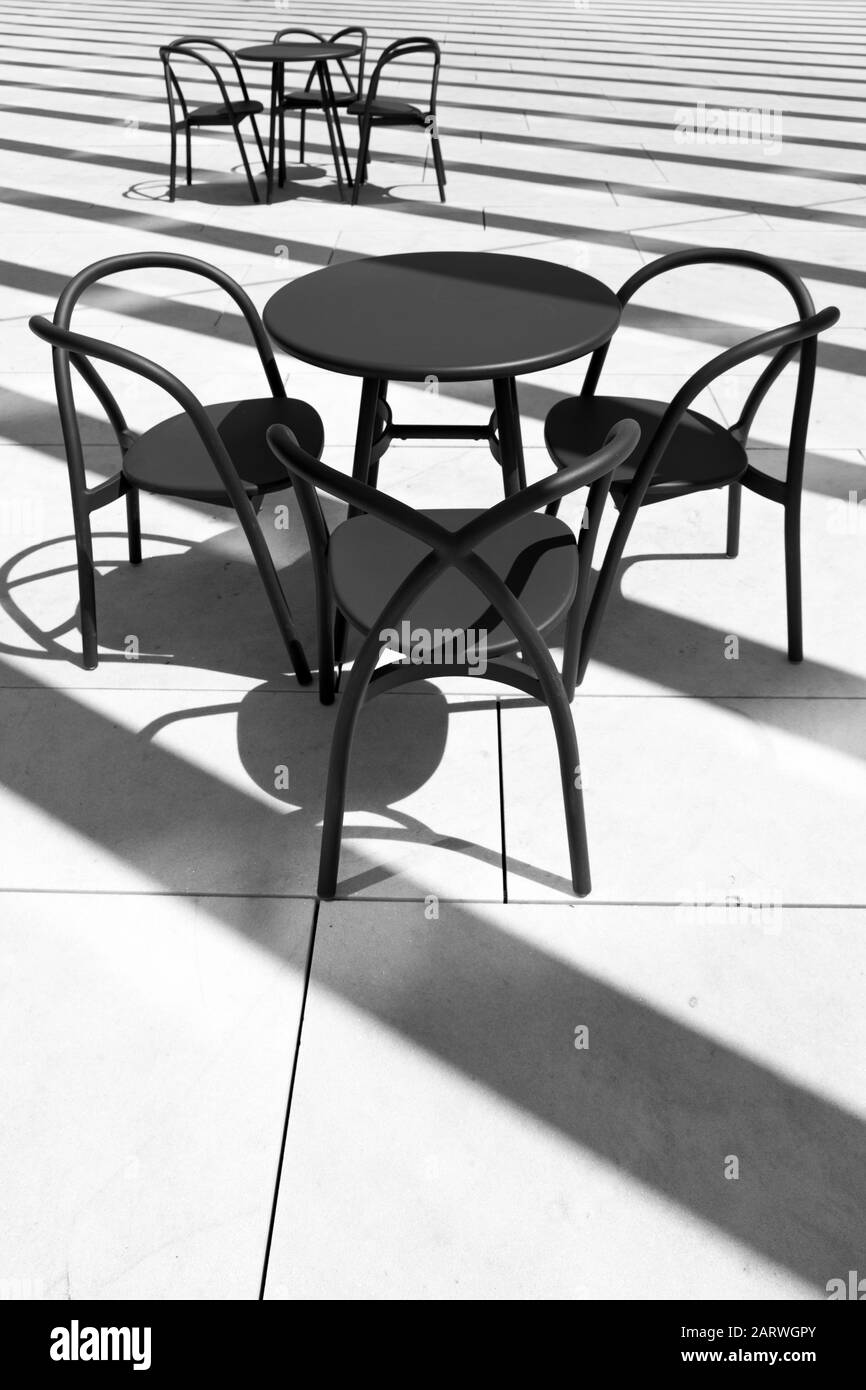 Retro black chairs hi-res stock photography and images - Alamy