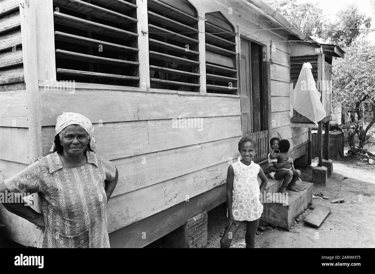 Suriname, The Erven, Poverty; people between their slum dwellings Date: April 1, 1975 Keywords: Poverty, PEOPLE, slum houses Personal name: De Erven Stock Photo