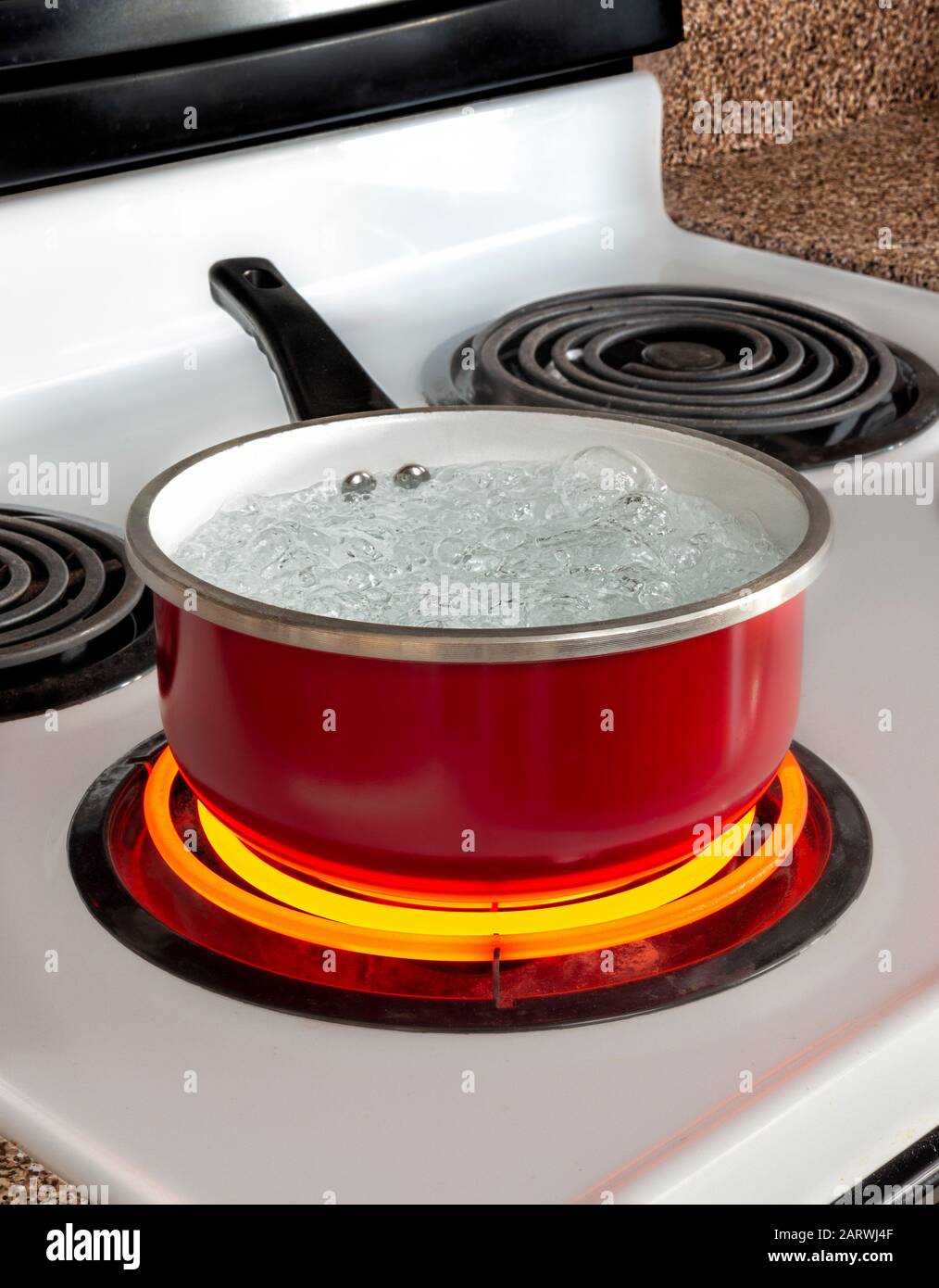 https://c8.alamy.com/comp/2ARWJ4F/vertical-shot-of-a-red-pan-of-boiling-water-on-top-of-a-stove-with-the-burner-turned-to-high-2ARWJ4F.jpg