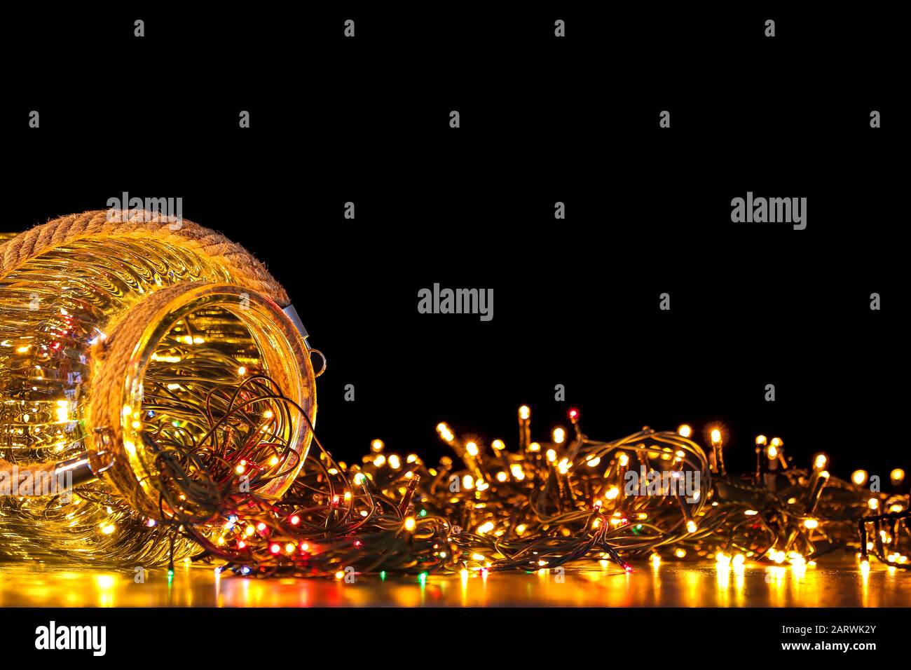 Vase With Glowing Christmas Lights On Table Stock Photo 341697859