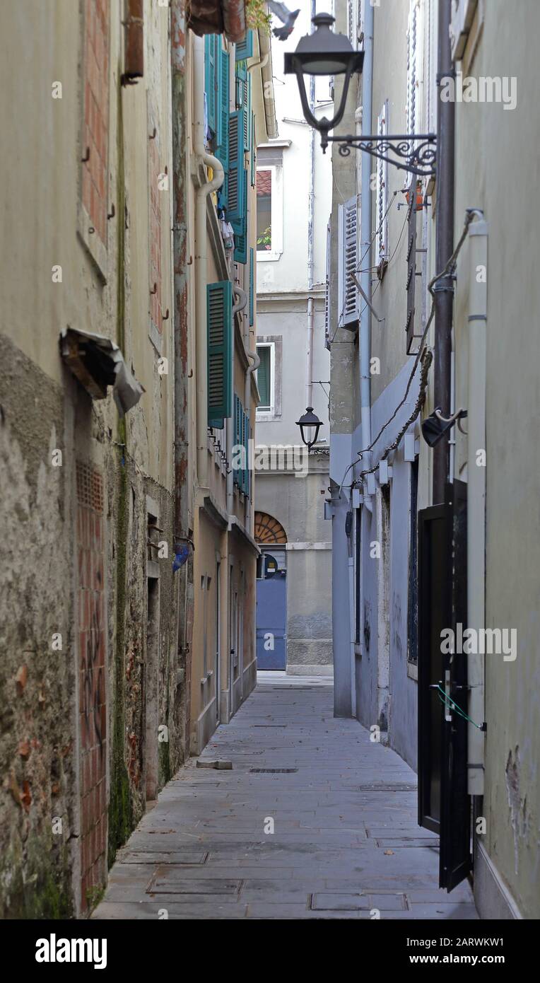 Narrow street Mediterranean style architecture in Trieste Stock Photo
