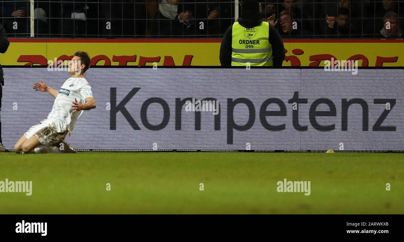 29 January 2020, Lower Saxony, Osnabrück: Football: 2nd Bundesliga, VfL Osnabrück - SV Sandhausen, 19th matchday in the stadium at Bremer Brücke. The goal scorer Kevin Behrens from Sandhausen celebrates his goal for the 1:2. Photo: Friso Gentsch/dpa - IMPORTANT NOTE: In accordance with the regulations of the DFL Deutsche Fußball Liga and the DFB Deutscher Fußball-Bund, it is prohibited to exploit or have exploited in the stadium and/or from the game taken photographs in the form of sequence images and/or video-like photo series. Stock Photo
