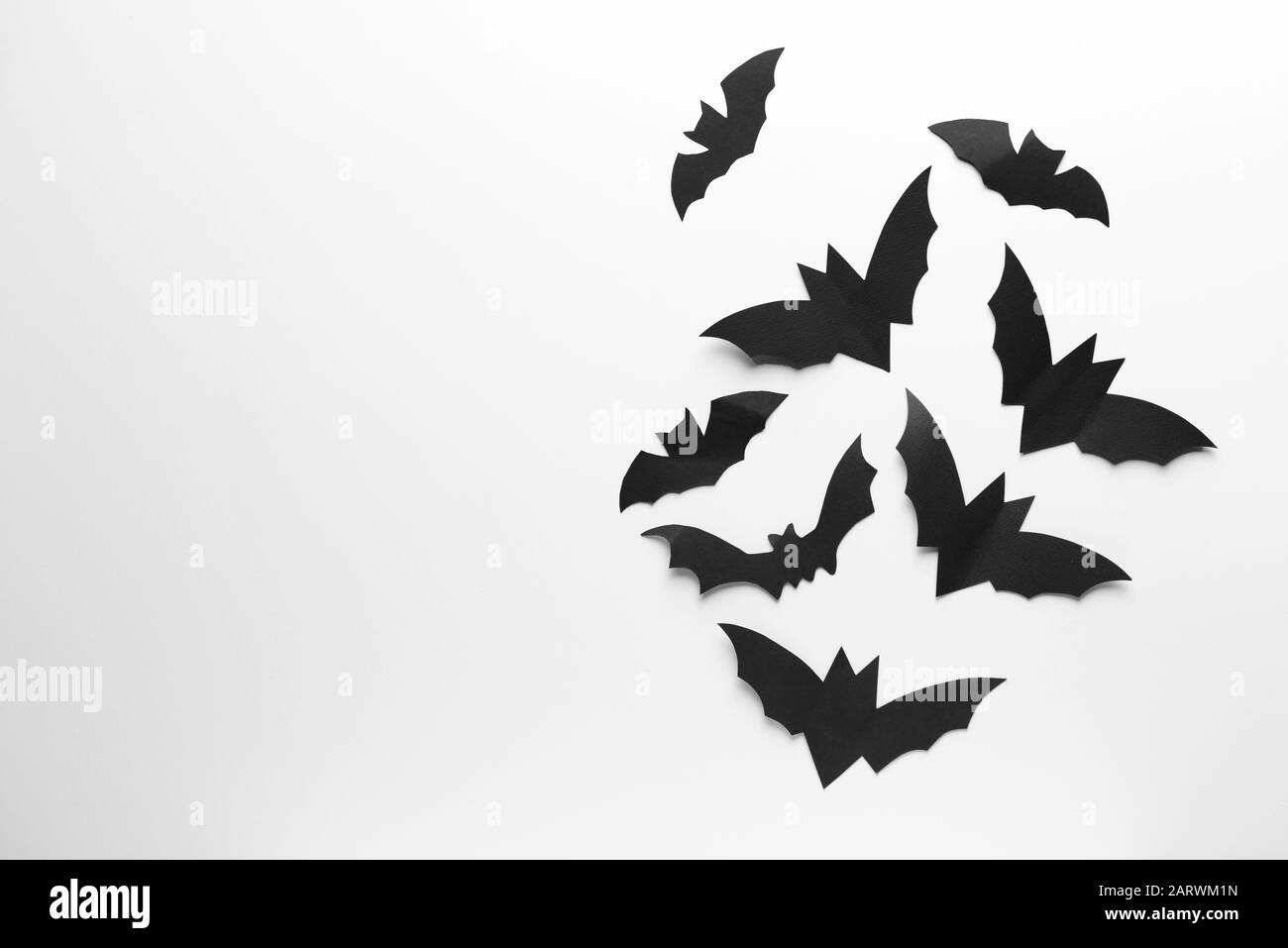 Paper bats as Halloween decor on white background Stock Photo - Alamy