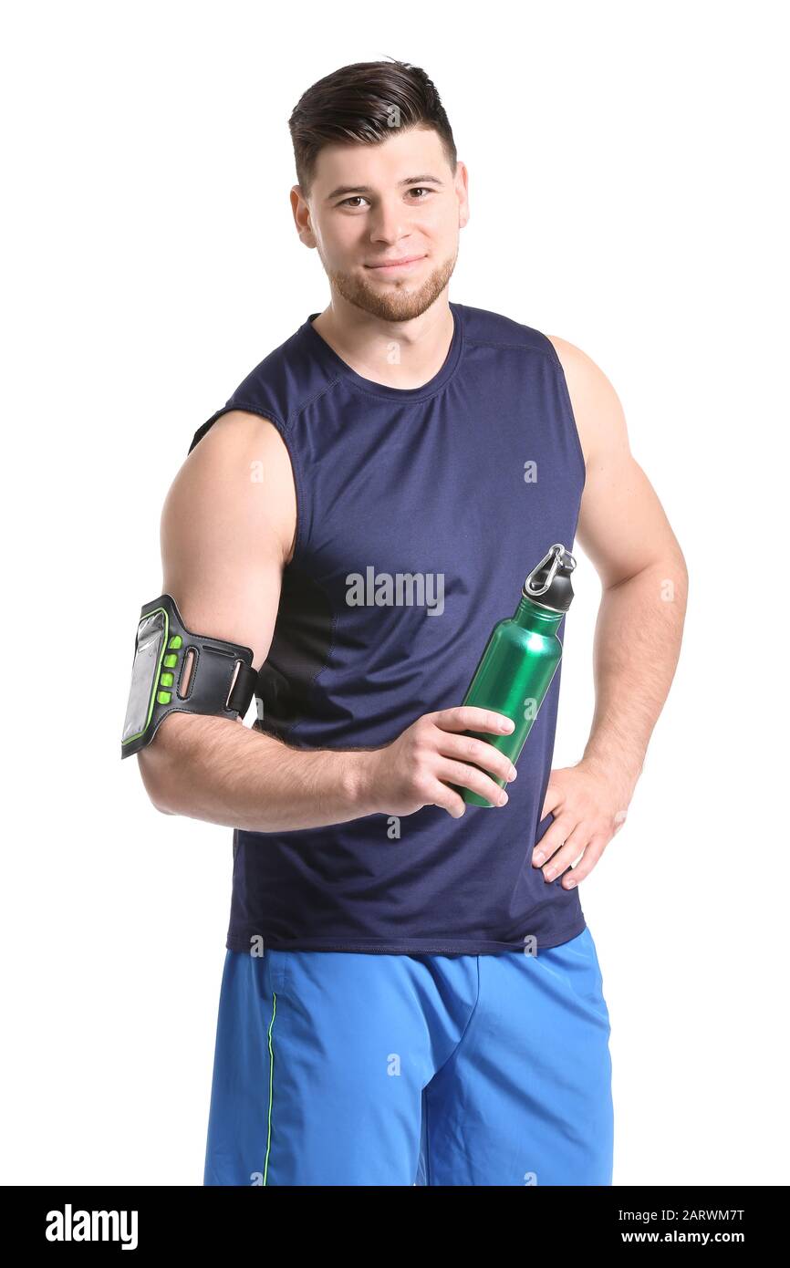 Sporty young man with bottle of water on white background Stock Photo ...