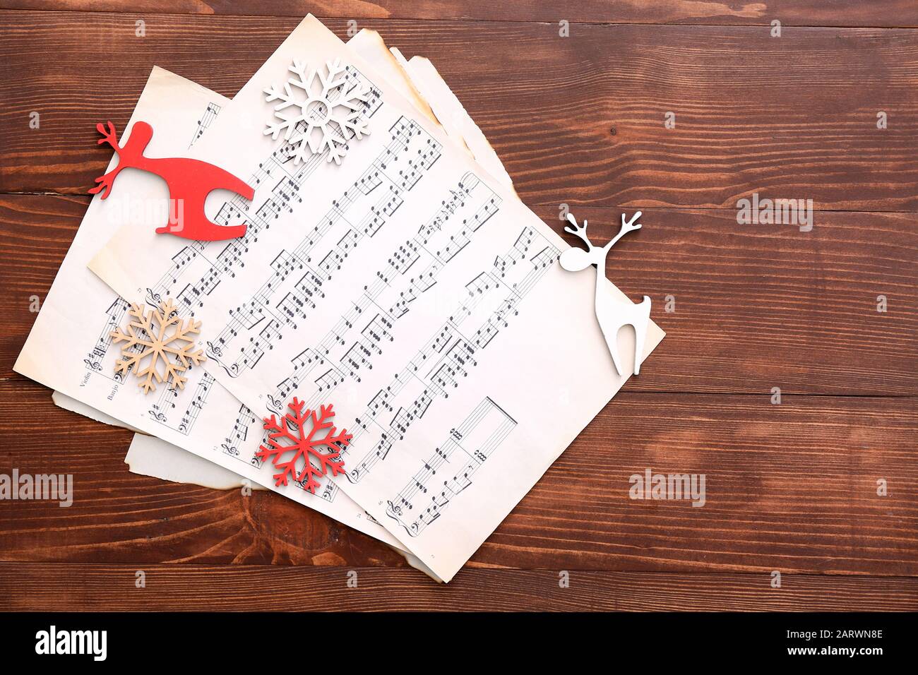 Note sheets and Christmas decor on table Stock Photo