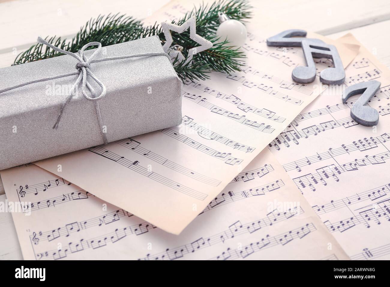 Note sheets, gift and Christmas decor on table Stock Photo