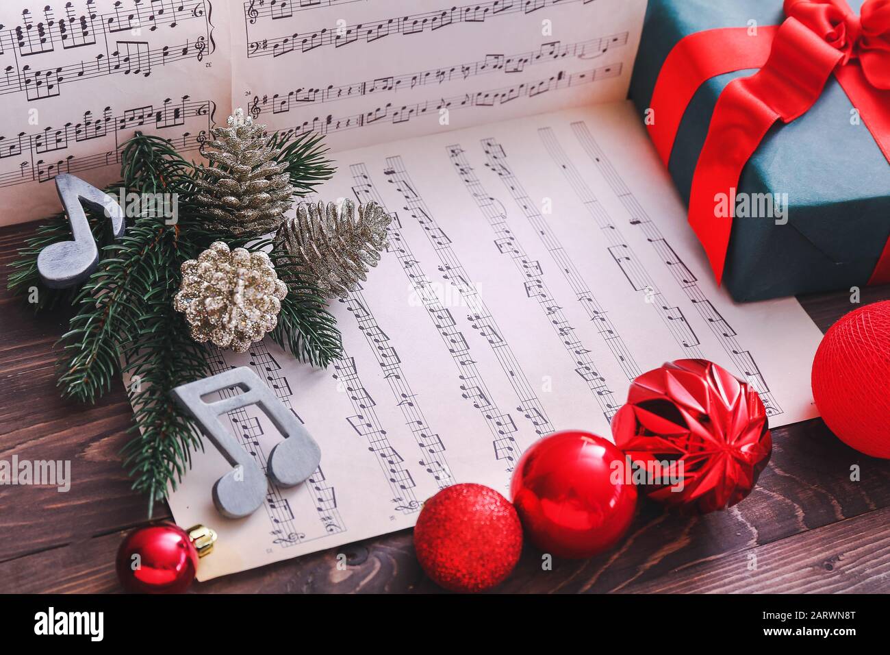 Note sheets, gift and Christmas decor on table Stock Photo