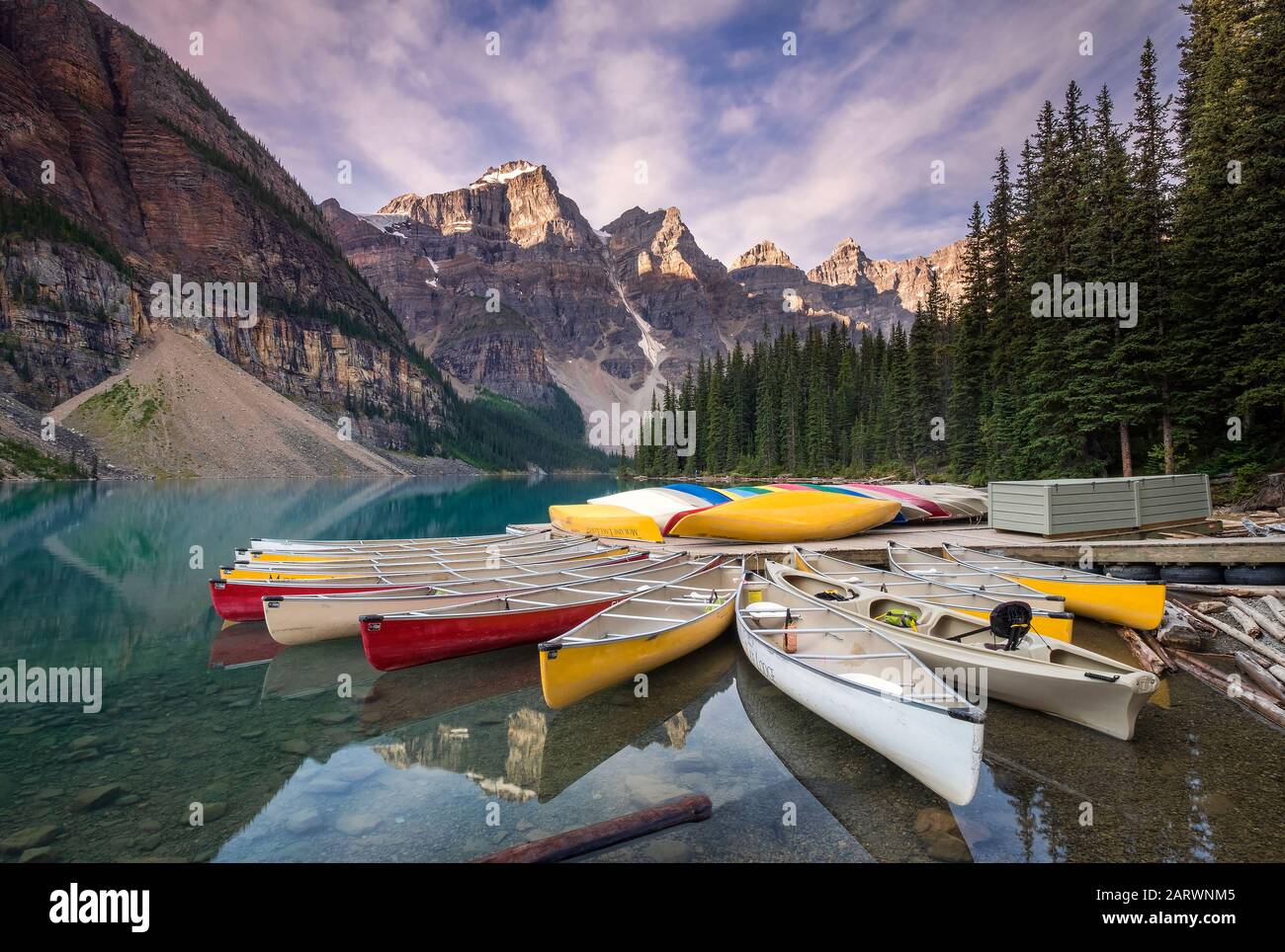 Multicoloured Canoes on Moraine Lake, Valley of the Ten Peaks, Banff National Park, Canadian Rockies, Alberta, Canada Stock Photo