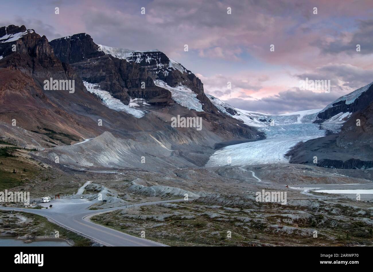 A Motorhome at the base of the Athabasca Glacier, backed by Mount Athabasca & Mount Andromeda, Jasper National Park, Canadian Rockies, Alberta, Canada Stock Photo
