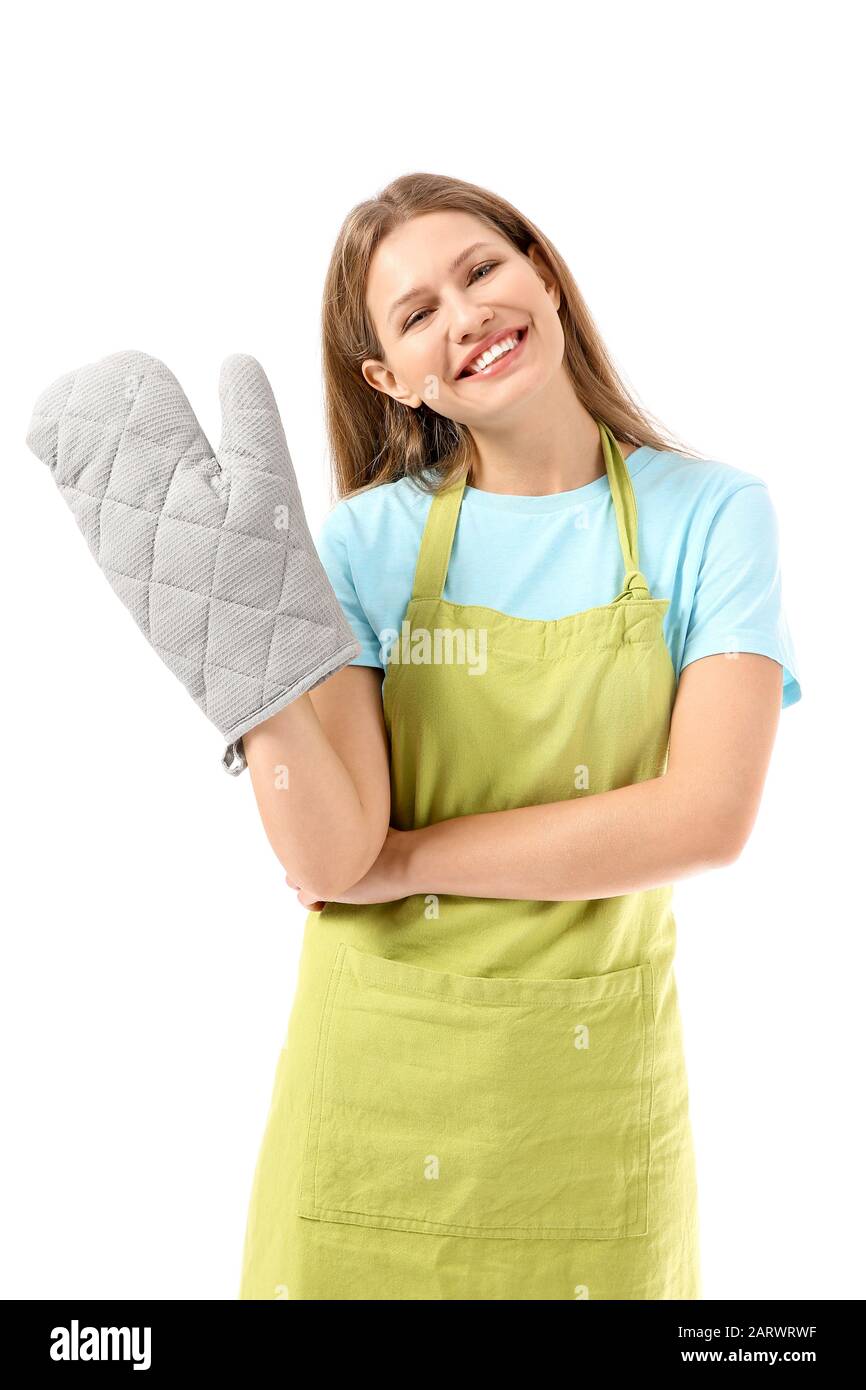 Beautiful young woman in apron on white background Stock Photo