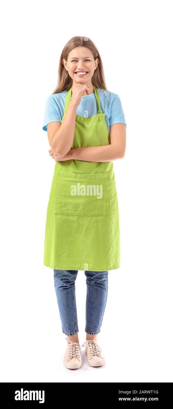 Beautiful young woman in apron on white background Stock Photo - Alamy
