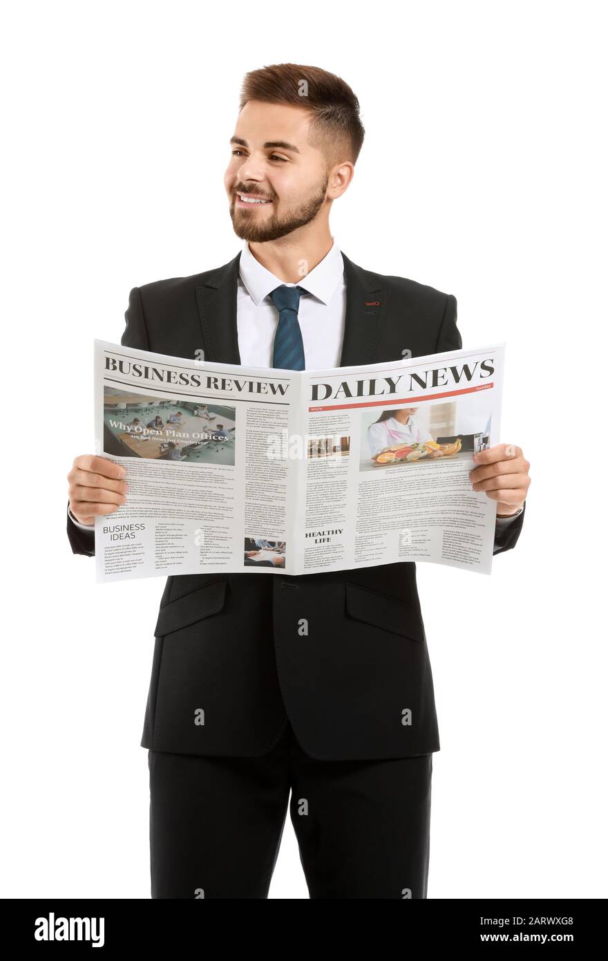 Handsome businessman with newspaper on white background Stock Photo - Alamy