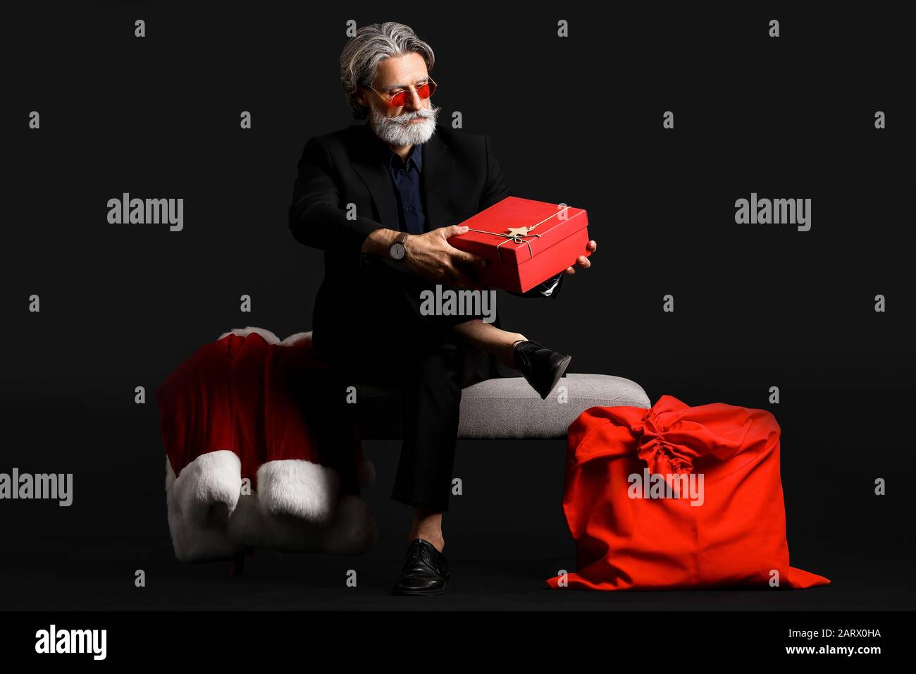 Santa claus sitting on bench hi-res stock photography and images - Alamy
