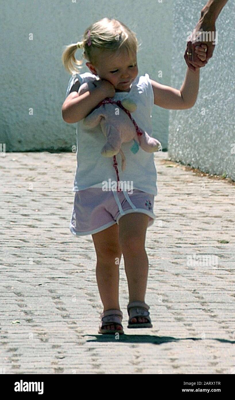 search youngest girls Kate and Gerry McCann taking their youngest daughter Amelie to the  children's creche at the Ocean Club in Praia Da Luz, whilst the search  continues for their missing daughter Madeleine who was