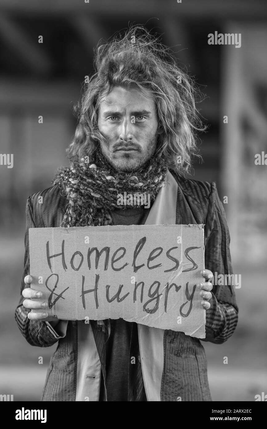 Black and white portrait of poor homeless man outdoors Stock Photo - Alamy