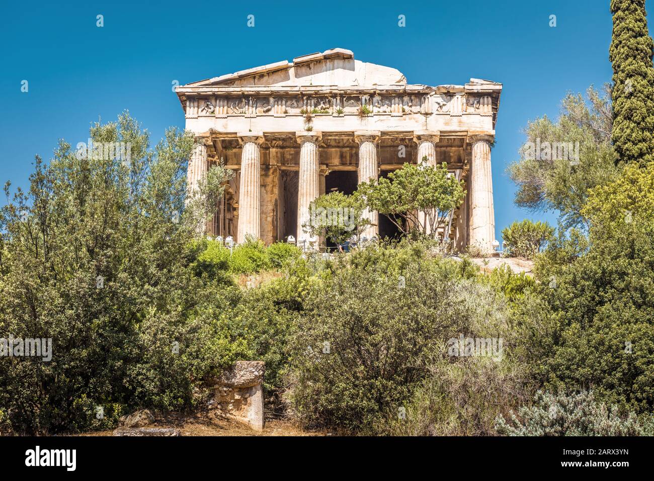 Temple of Hephaestus in Agora, Athens, Greece. It is a famous landmark of Athens. Scenic view of the Ancient Greek ruins in the Athens center. Beautif Stock Photo