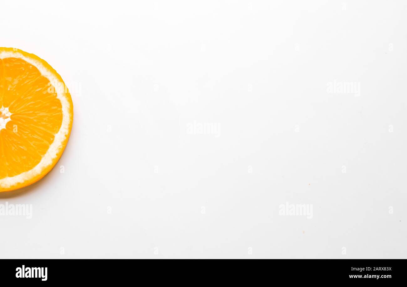 Fresh orange slice on white background Stock Photo - Alamy
