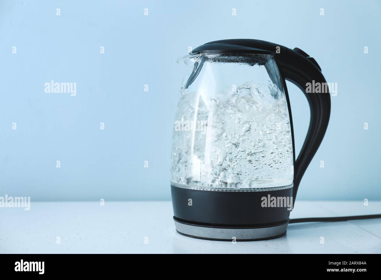 A Glass Electric Kettle With Boiling Water Inside Stock Photo