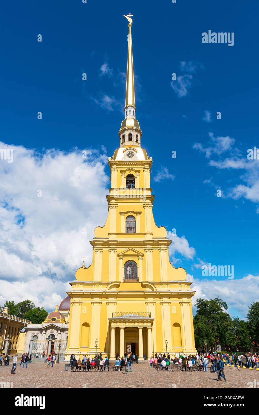 ST PETERSBURG, RUSSIA - JUNE 13, 2014: Tourists visit the Peter and Paul Cathedral. Russian emperors are buried here. Stock Photo