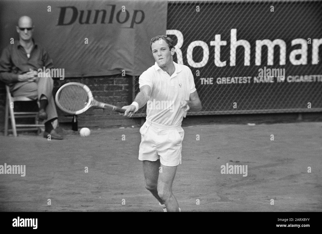 Open Dutch Tennis Championships 1969 in Hilversum Tom Okker in action Date:  August 2, 1969 Location: Hilversum, Noord-Holland Keywords: sport, tennis,  competitions Personal name: Okker, Tom Stock Photo - Alamy